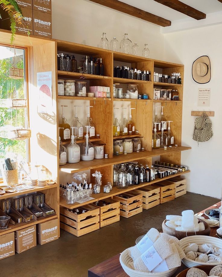 Refill shop shelves lined with glass bottles and jars